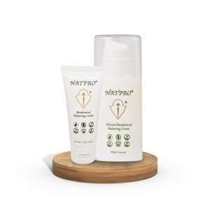 Natpro tube and dispenser on wooden stand